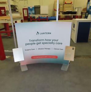 Modified SYK-001 Symphony Portable Table Top Display with SEG Fabric Graphic, MOD-1381 Literature Tray, MOD-1376 iPad Clamshell, and (2) LED Adjustable Arm Lights